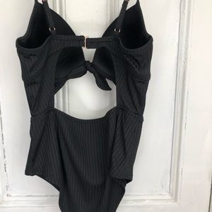 A women’s one piece bathing suit